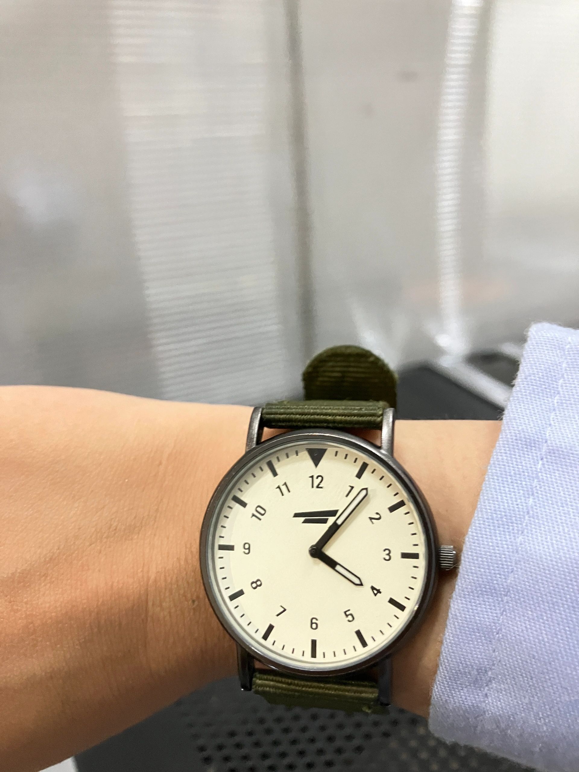 Close-up of a woman wearing a luxury wristwatch